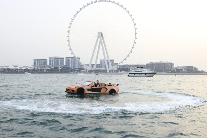 Experience the rush of Dubai as you navigate sparkling waters and city landmarks in a high-powered jet car and exhilarating jet ski ride blending land and sea adventure seamlessly.